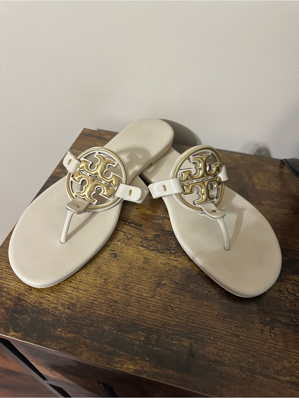 Tory Burch Ivory Leather Logo Thong Sandals with Gold Emblem